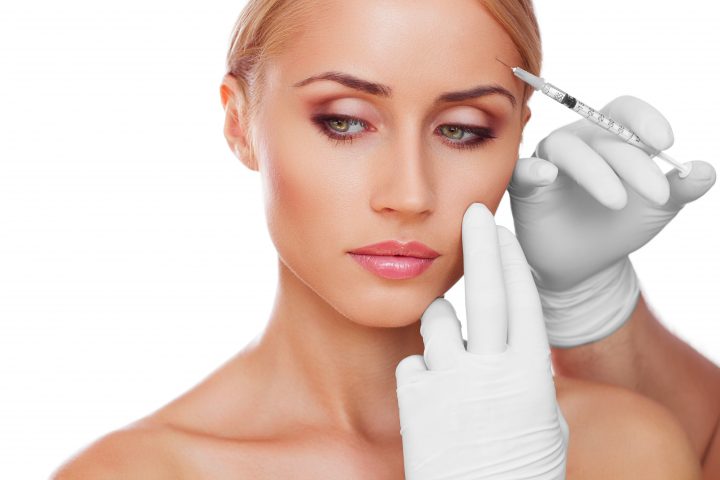 Cosmetic injection to the pretty woman face