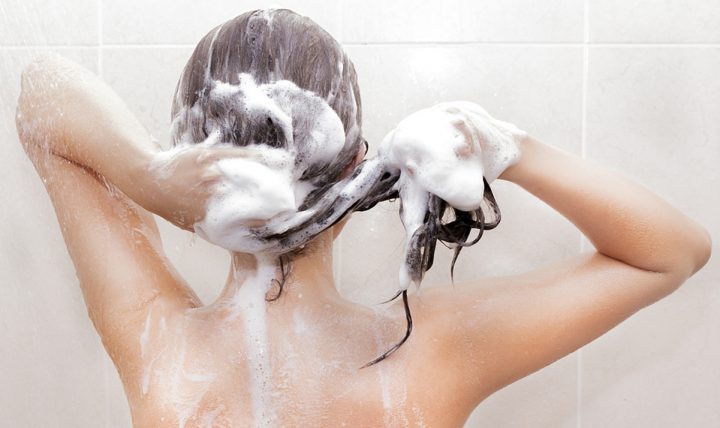 Woman washing her hair; Shutterstock ID 106626536; PO: StyleList Quebec